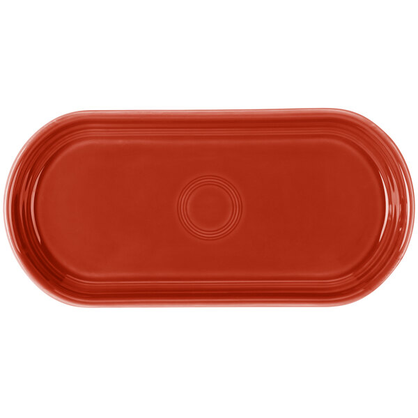 A red rectangular Fiesta bread tray with a circle in the middle.