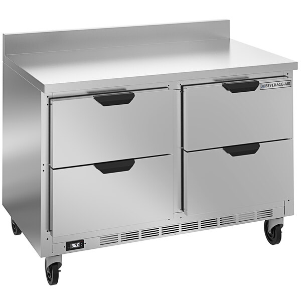 A stainless steel Beverage-Air worktop refrigerator with drawers.