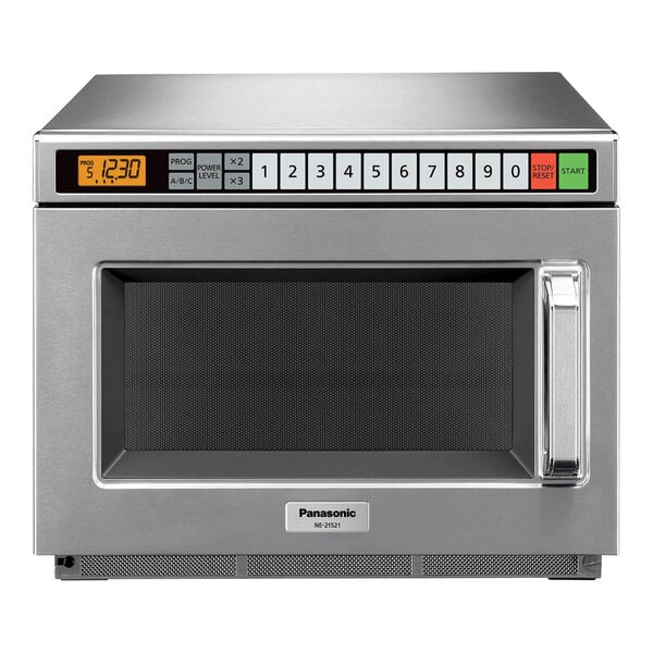 A Panasonic stainless steel commercial microwave oven with a digital display.