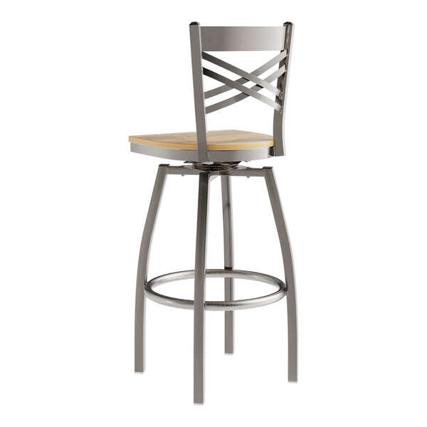 A Lancaster Table & Seating metal bar stool with a wooden seat and a clear coat finish.