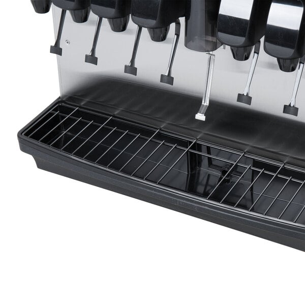 A Servend countertop ice and beverage dispenser with a sanitary lever.