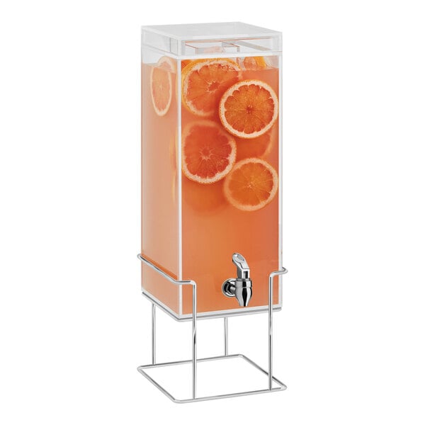 A Cal-Mil plastic beverage dispenser with orange slices in the ice chamber.