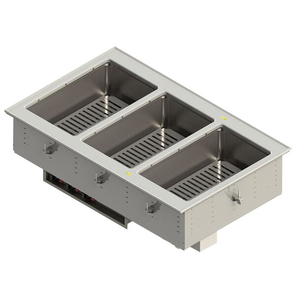 A Vollrath stainless steel drop-in hot food well with three compartments on a counter.