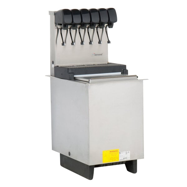 A Servend soda fountain machine with six taps and an ice storage bin.