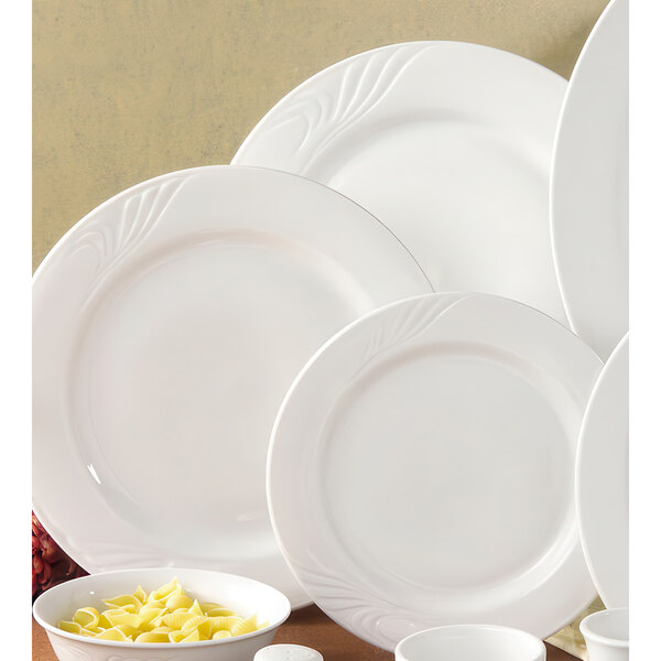 A group of CAC Roosevelt super white porcelain plates.