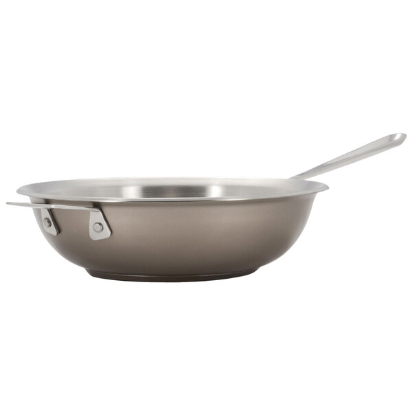 A Bon Chef stainless steel chef's pan with a taupe lid.