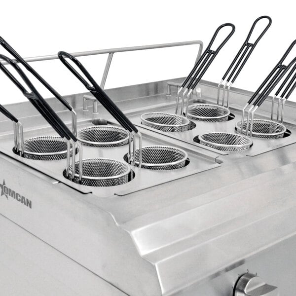 A close-up of a black metal Omcan pasta cooker handle.