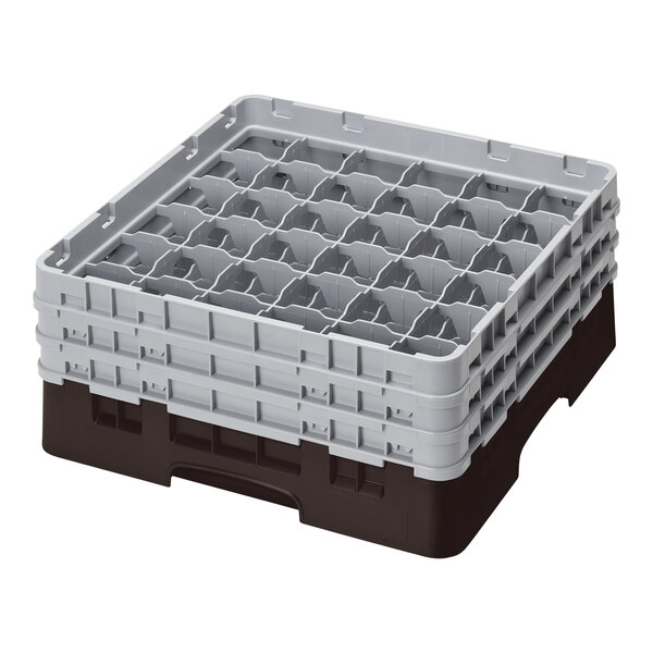A brown plastic Cambro glass rack with 36 compartments.