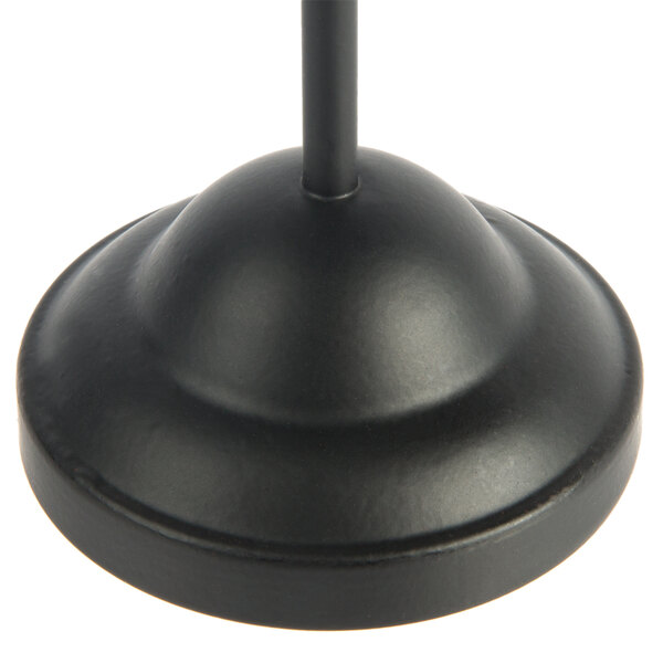 An American Metalcraft black harp card holder with a weighted black base and long stem.