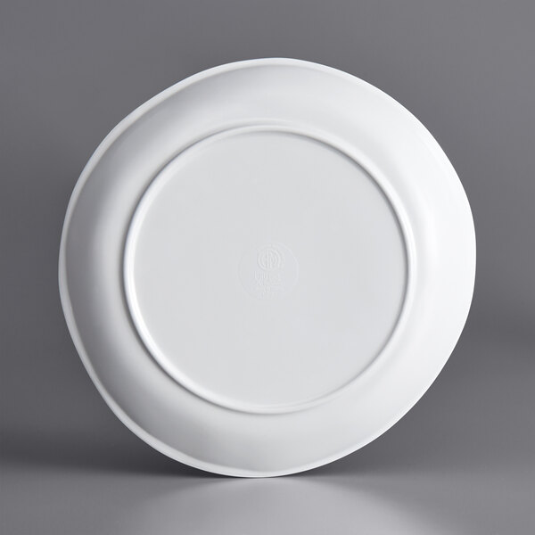 An American Metalcraft Crave melamine plate with a circular rim.