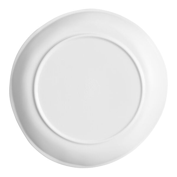 A white, round plate shown from the bottom view against a white background.
