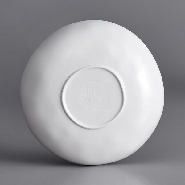 A white American Metalcraft melamine bowl with a circular design.