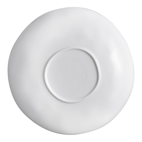 The image shows the underside of a white, round bowl with a slightly raised circular base and a smooth, glossy finish.