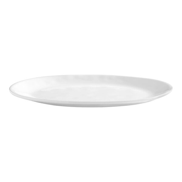 A plain white oval serving platter with a smooth surface and slightly raised edges.