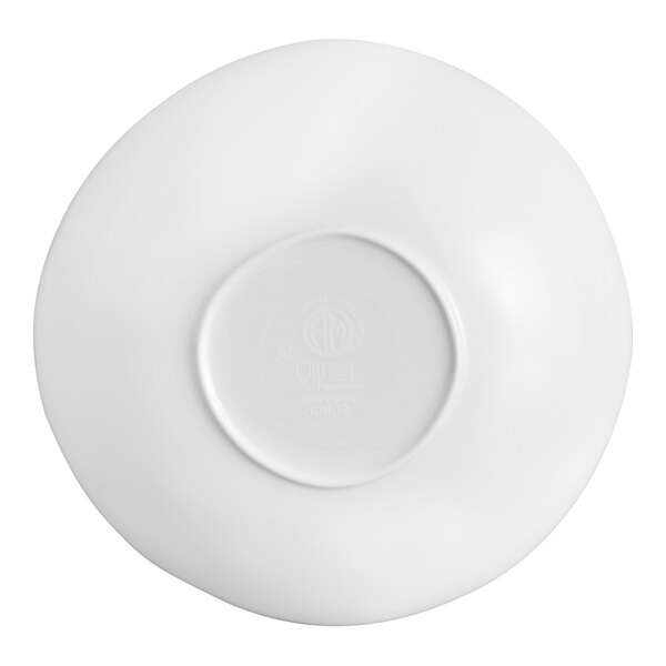 A white bowl shown upside down, displaying its smooth, rounded base and subtle embossed markings in the center.
