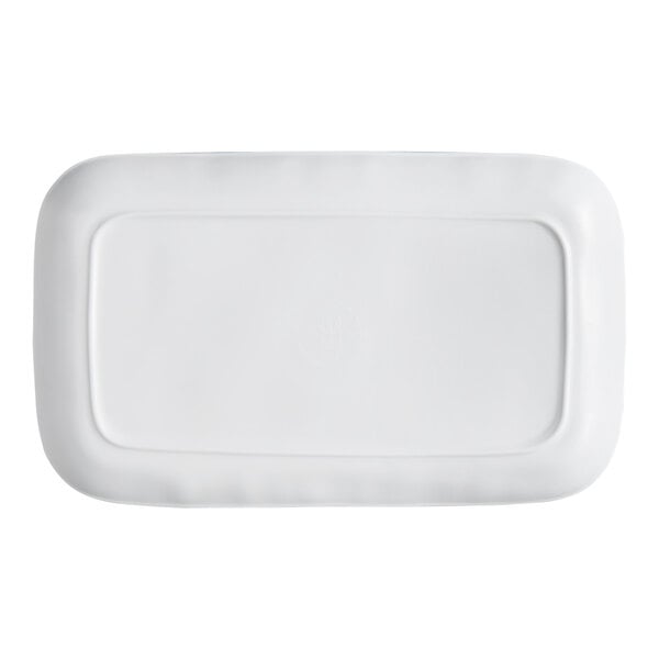 A rectangular white platter with rounded edges and a slightly raised border.