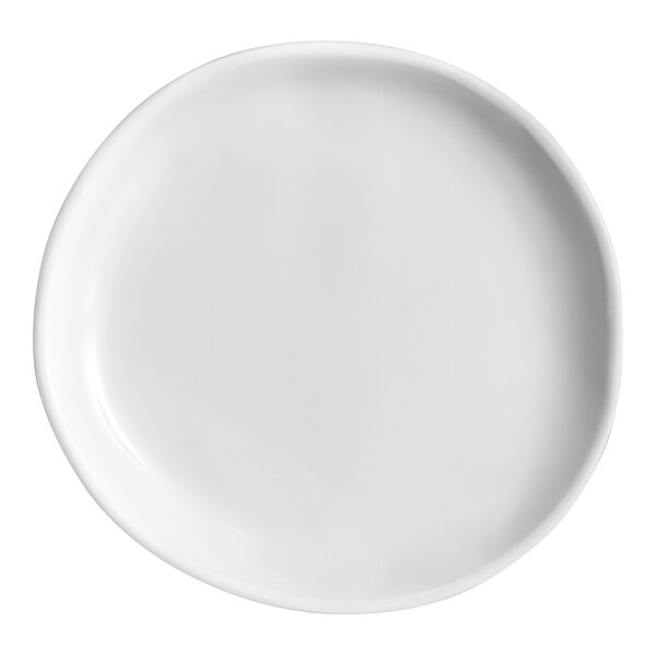A round, white plate with a slightly irregular, organic shape and smooth surface.