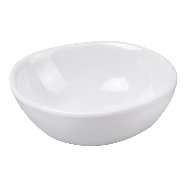 A small, white, round bowl with a slightly irregular, organic shape.
