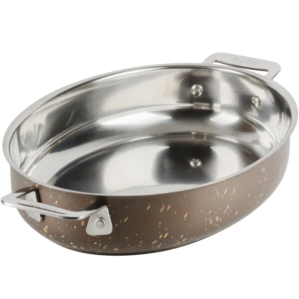A Bon Chef stainless steel oval au gratin dish with handles.