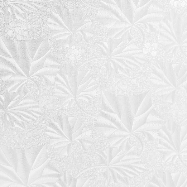 A white surface with a floral pattern.