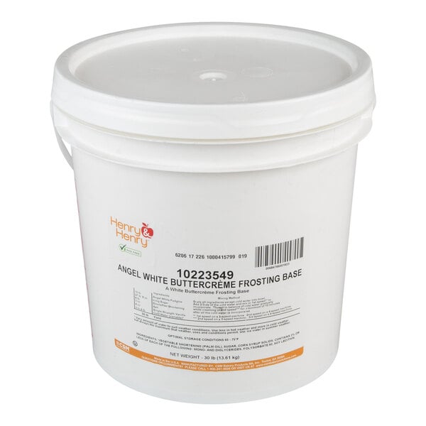 A large white plastic bucket with a lid and a label indicating it contains angel white buttercreme frosting base.