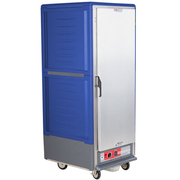 A blue and silver Metro C5 3 Series heated holding cabinet with a solid door.