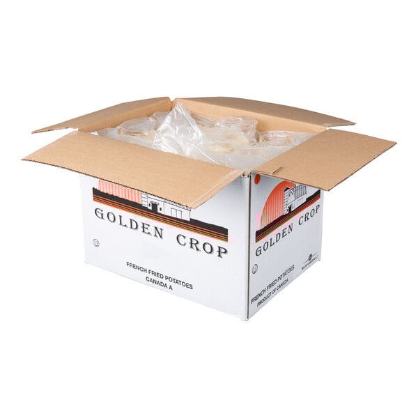 A cardboard box labeled 'Golden Crop' containing multiple bags of crinkle cut French fries.
