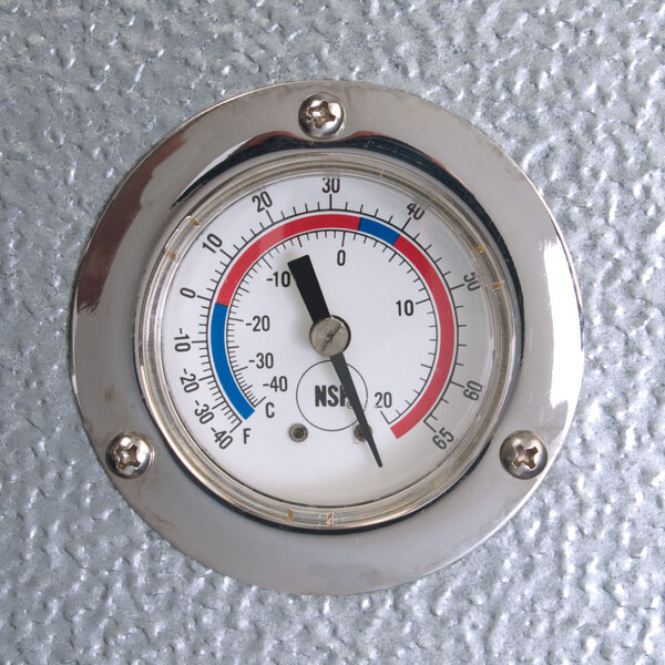 The temperature gauge on the top of a Kolpak walk-in cooler.
