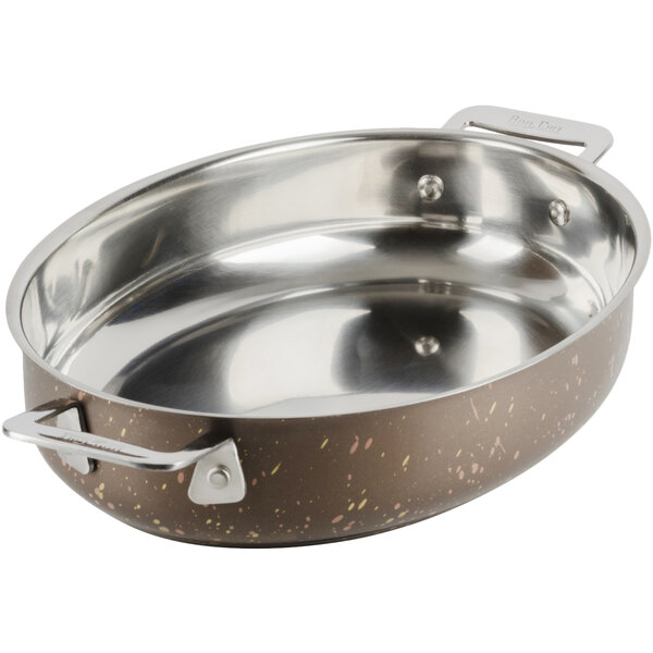 A Bon Chef stainless steel oval au gratin dish with a handle.