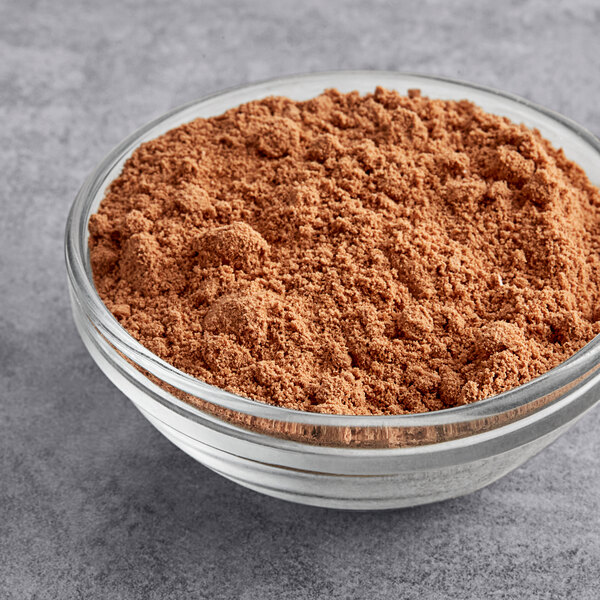 A glass bowl filled with Bake'n Joy Foods Chocolate Pudding Cake Mix.