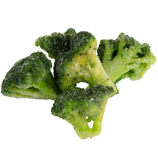 A group of frozen broccoli florets in a pile.