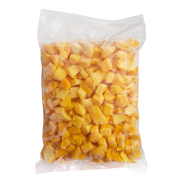 A bag of diced mangoes on a white background.