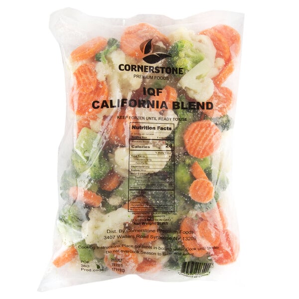 A white and blue bag of IQF California Vegetable Blend with carrots and broccoli.