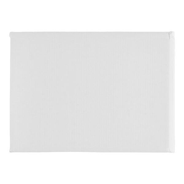 A rectangular white cake board with fold-under edges, designed for half sheet cakes.