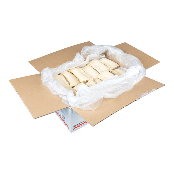 A case of ready-to-bake almond bear claw pastries individually arranged in a lined cardboard box.