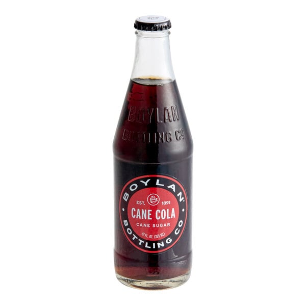 A glass bottle of Boylan Bottling Co. Cane Cola containing 12 fluid ounces.