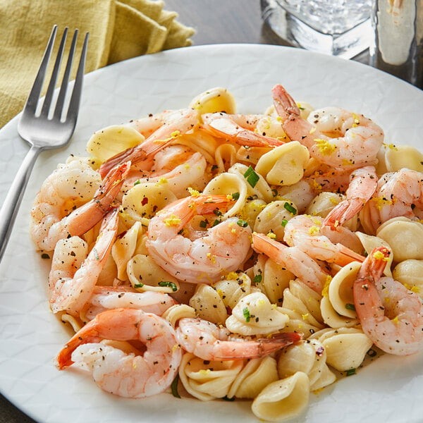 Extra large sized shrimp served with pasta