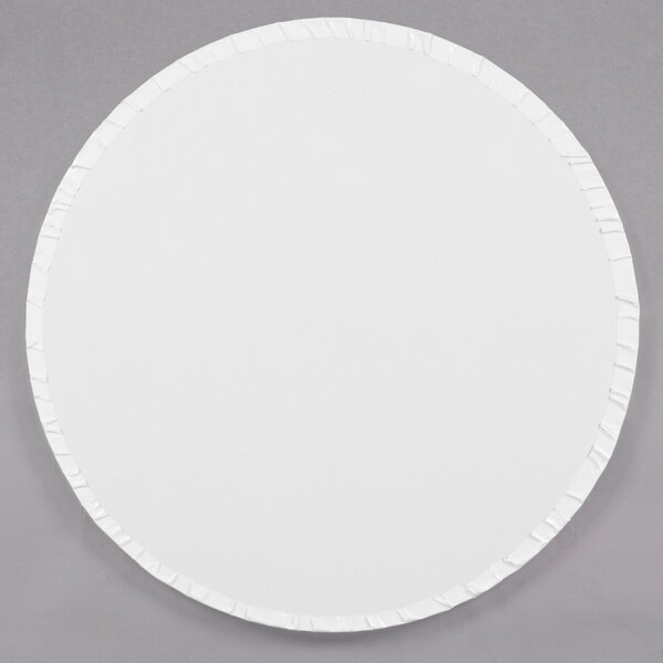 A white round Enjay cake drum with white edges.