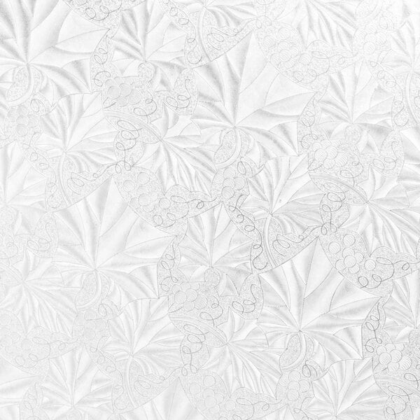 A white surface with leaves.