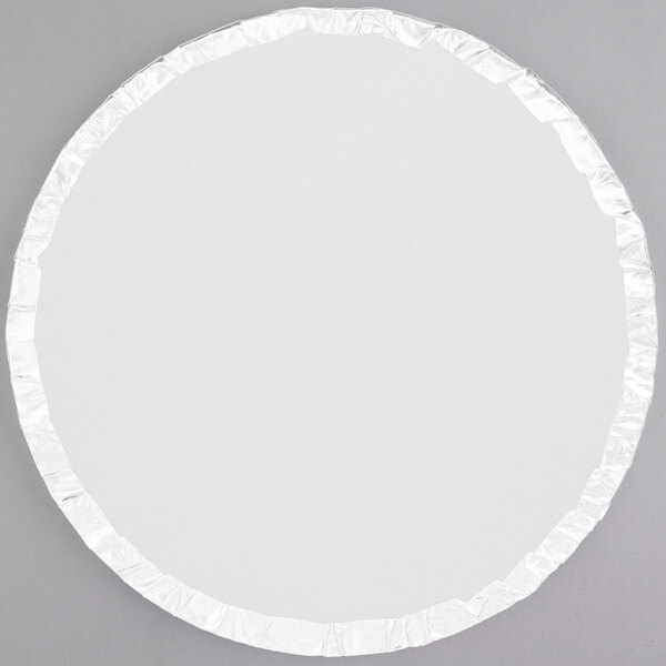 A white round Enjay cake drum with a silver foil edge.