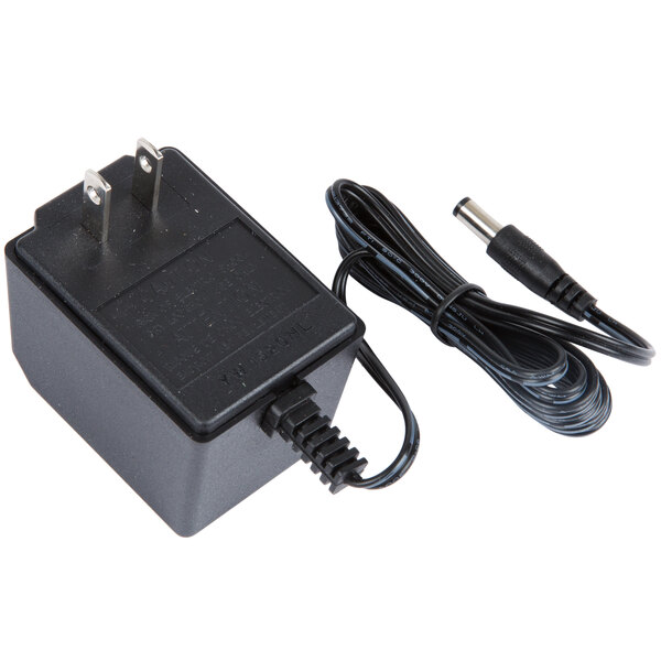 A black Taylor power cord with plugs.