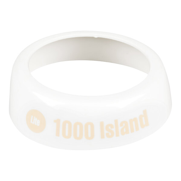 A white plastic salad dressing dispenser collar imprinted with beige lettering that reads 'Lite 1000 Island.'