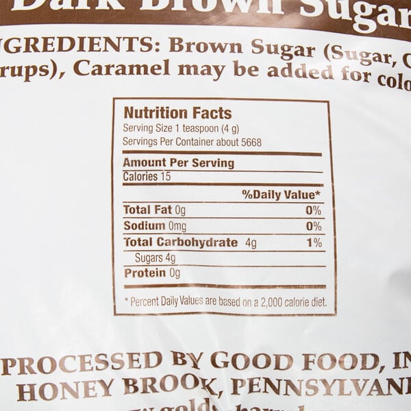 A Golden Barrel bag of dark brown sugar on a counter.