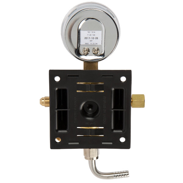 A close-up of a Servend Bag-in-Box secondary regulator with a black and white pressure gauge and metal parts.