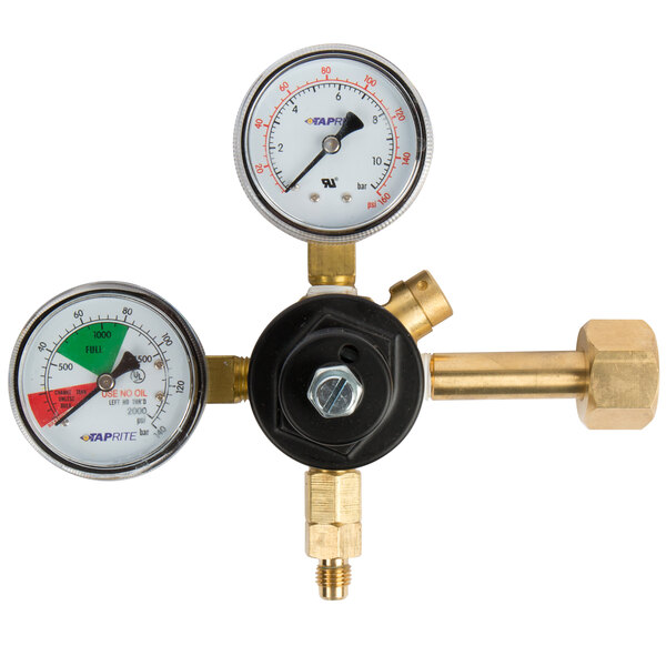 A close-up of a Servend gas regulator with two gauges.