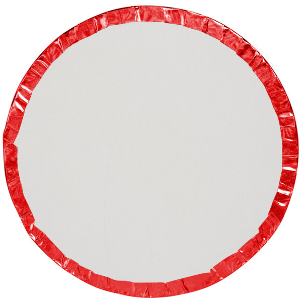 A round white plate with red trim.