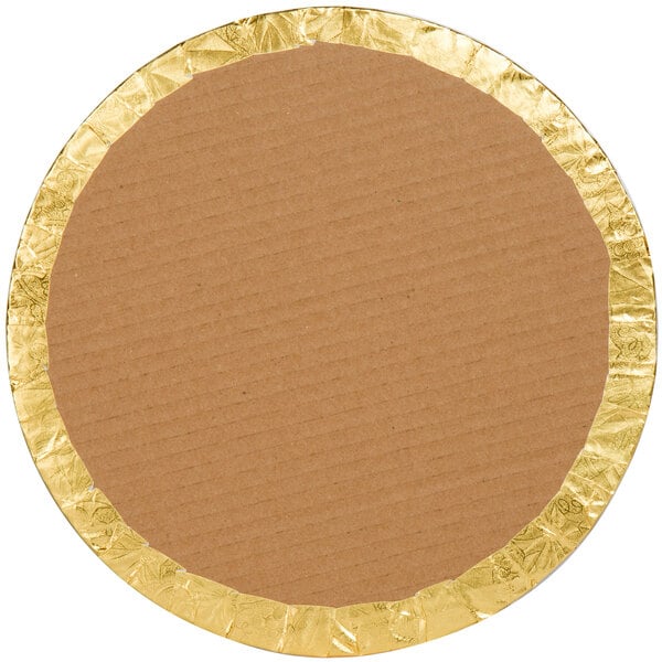 A white round cardboard cake drum with gold foil.