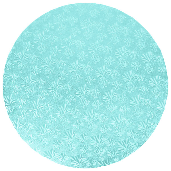 A blue round Enjay cake drum with white flowers on it.