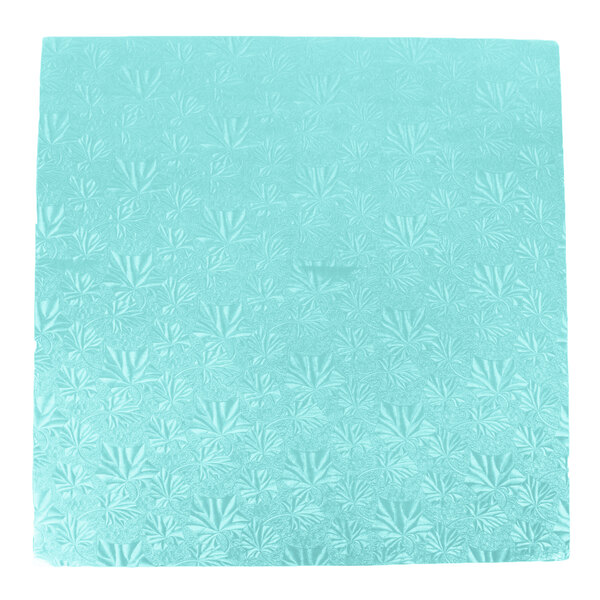 A blue square Enjay cake drum with a pattern on it.