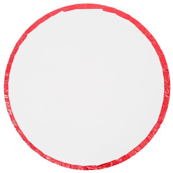 A white round cake drum with a red rim.